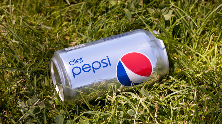 Can of Diet Pepsi in the grass