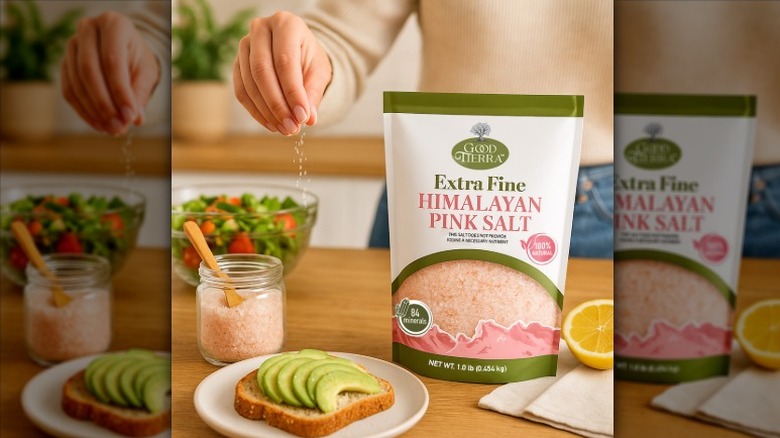 A bag of Good Tierra Extra Fine Himalayan Pink Salt on a counter with a woman sprinkling it on avocado toast.