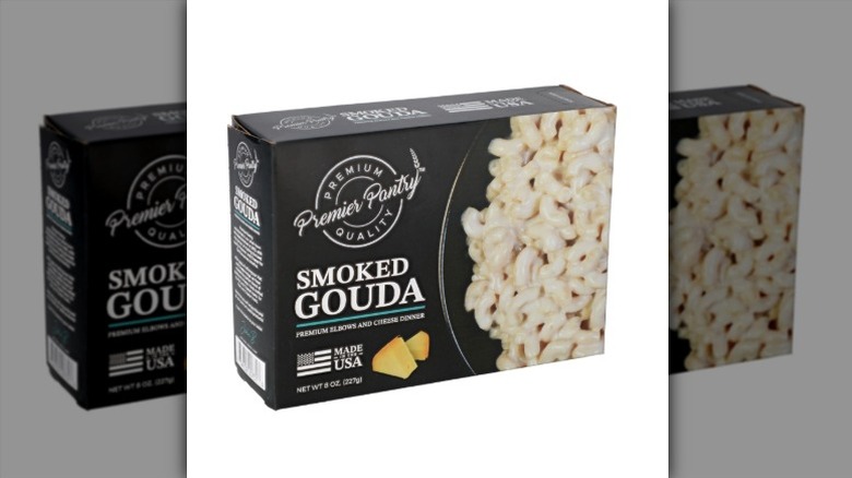 A box of Premier Pantry Smoked Gouda Elbows and Cheese Macaroni Dinner on a white background.