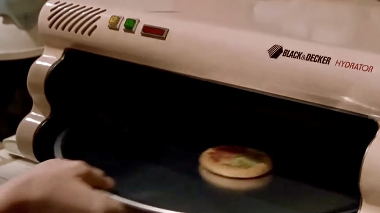 Mini Pizza Hut pie placed in a Black & Decker Hydrator