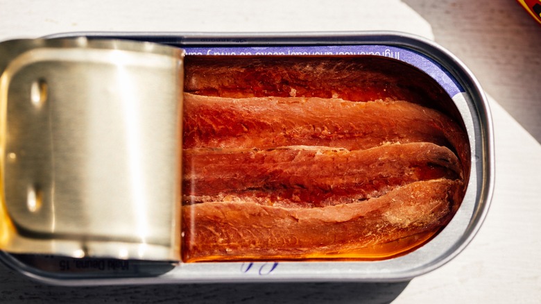 Open can of anchovies