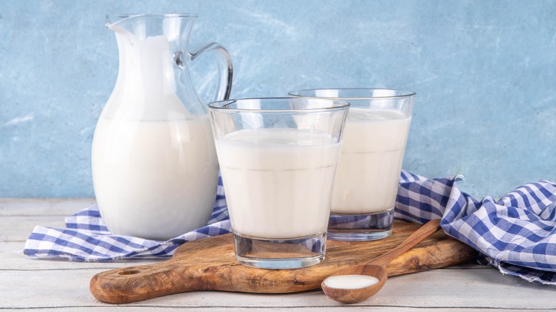 Pitcher and glasses of milk