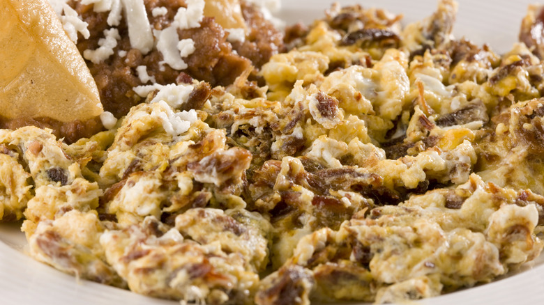 scrambled eggs with machaca, cheese, and tortilla chips