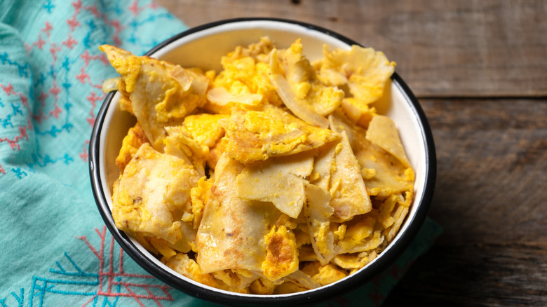 bowl of migas made with corn tortillas