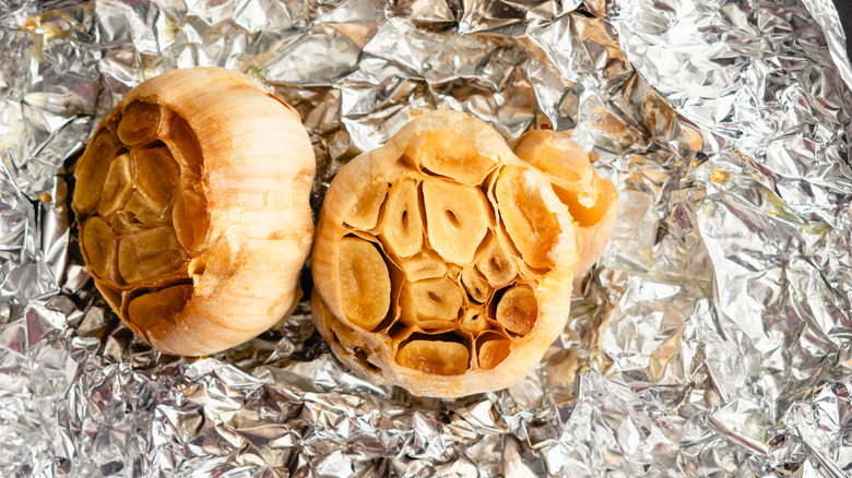 Roasted garlic on aluminum foil