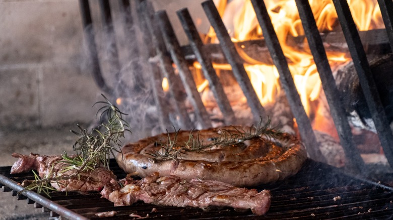 Grilled meat sausages on an Italian bbq