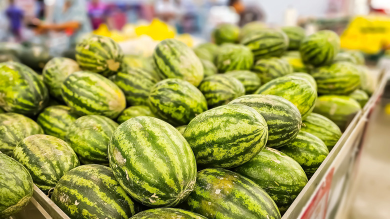 Piles of watermelon in store
