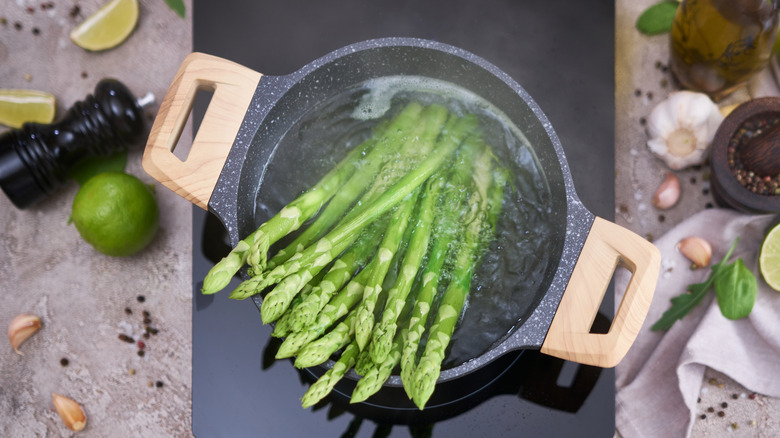 Asparagus boiling in pot