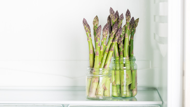 Asparagus in jars in fridge