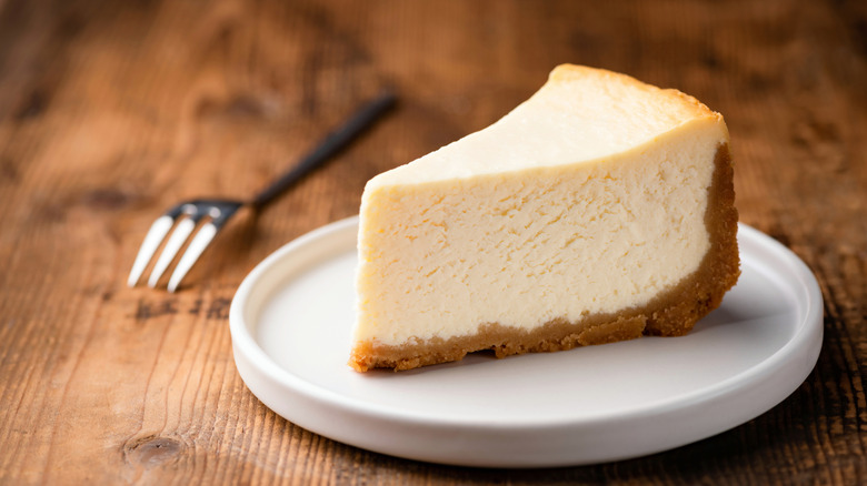 Slice of cheesecake on plate