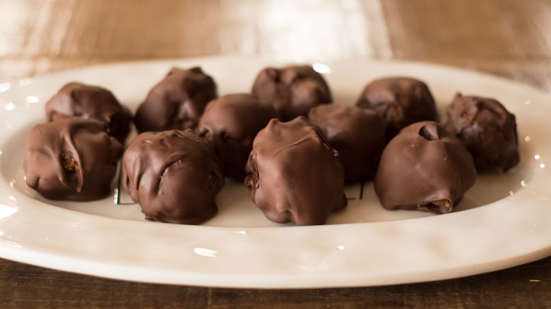 Bourbon balls on white plate