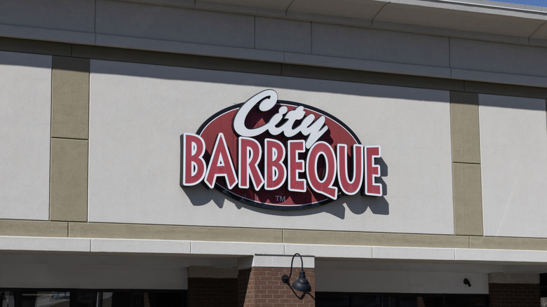 A City Barbecue sign on the outside of a building