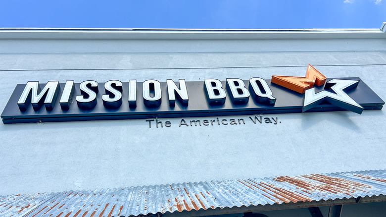 A Mission BBQ sign attached to a building