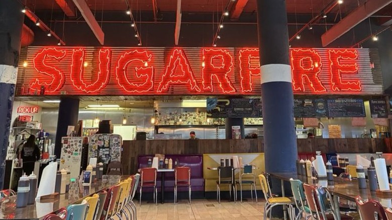 The interior of a Sugarfire Smoke House restaurant