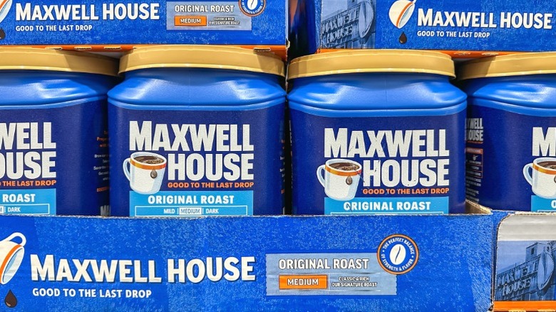 Buckets of Maxwell House ground coffee.