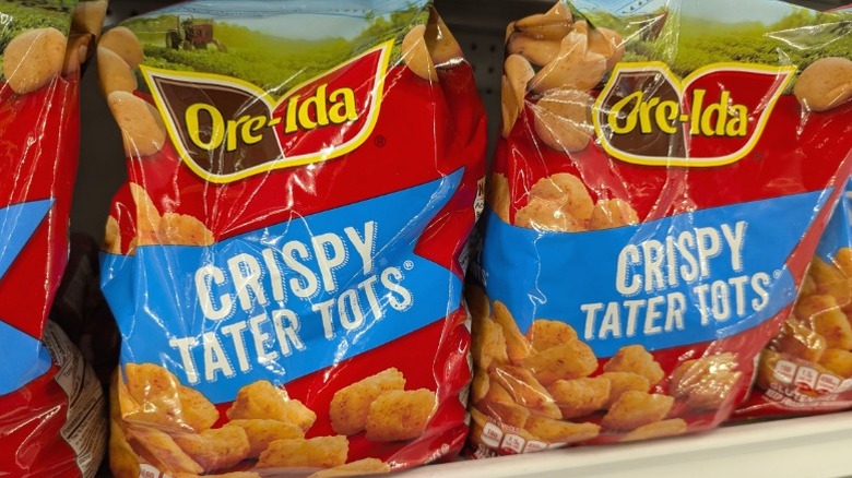 Bags of Ore-Ida Crispy Tater Tots on sale.