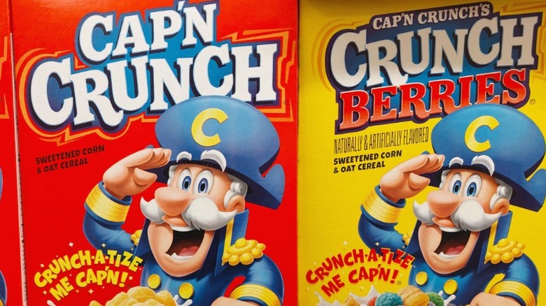 Boxes of Cap'n Crunch on a supermarket shelf.