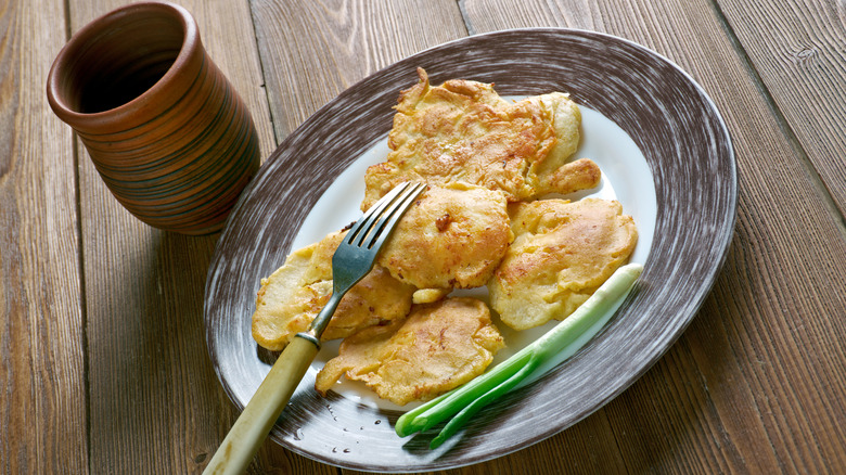 Salt cod pancake like fritters called bacalaítos from Puerto Rico on plate