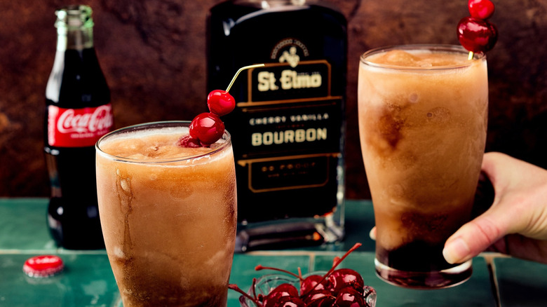 Elmo Cola with cherries, bottle of Coke, and St Elmo bourbon