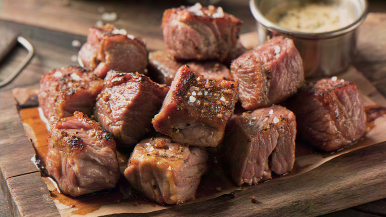 Cubes of seasoned cooked meat