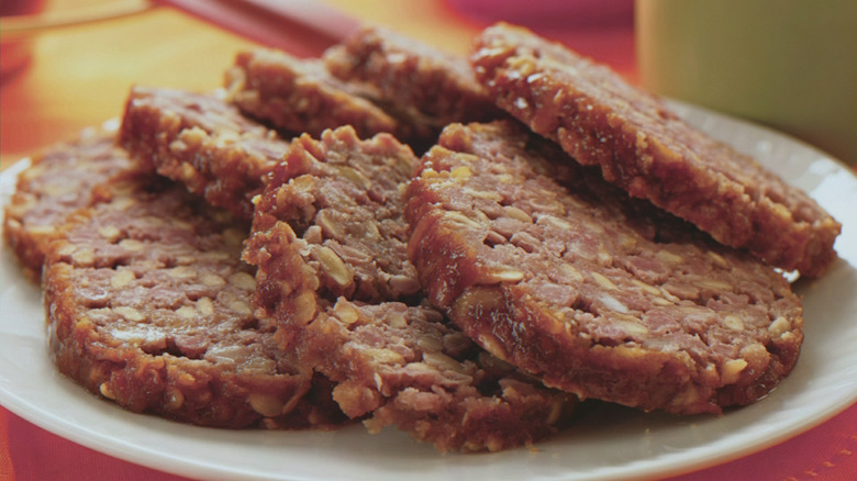 Slices of goetta on a plate