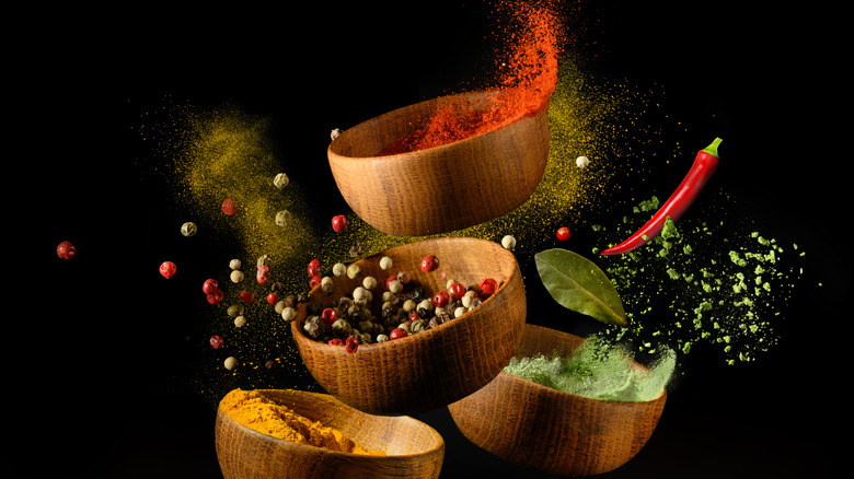 Spices in wooden bowls