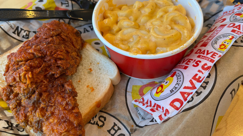 Spicy chicken tender with a side of mac and cheese