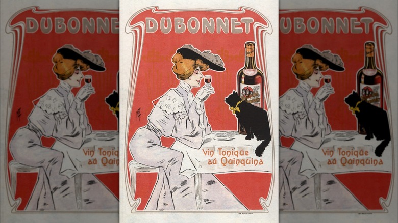A vintage poster depicting an elegant woman sipping Dubonnet while a black cat watches.