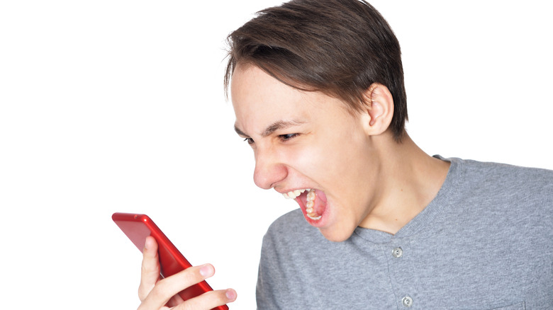 Man yelling at his phone
