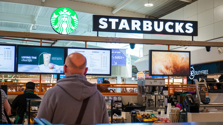 Man waiting to place Starbucks order