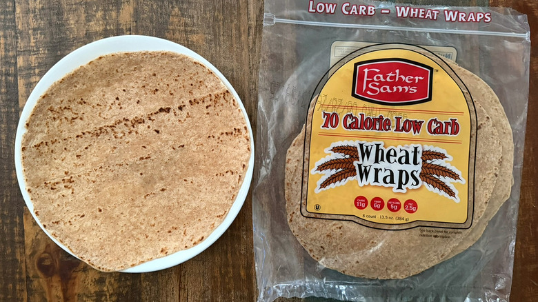 A package of Father Sam's Wheat Wraps next to a wrap on a plate