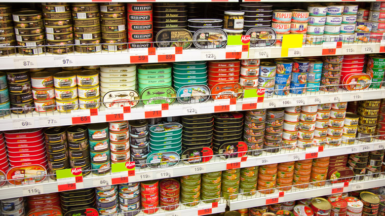 Cans of meat on grcoery store shelves