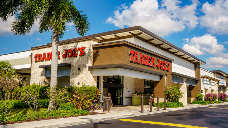 Trader Joe's Store with palm trees and clouds