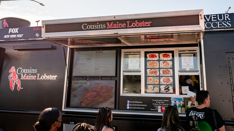 Exterior of a Cousins Maine Lobster food truck during the day