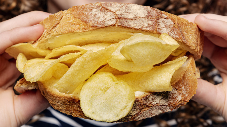 chip sandwich held by two hands