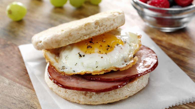 close-up of egg and ham breakfast sandwich
