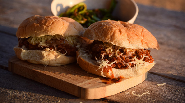 lentil sloppy joe sandwiches on wooden platter