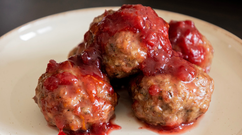 turkey meatballs served with a reduced cranberry sauce