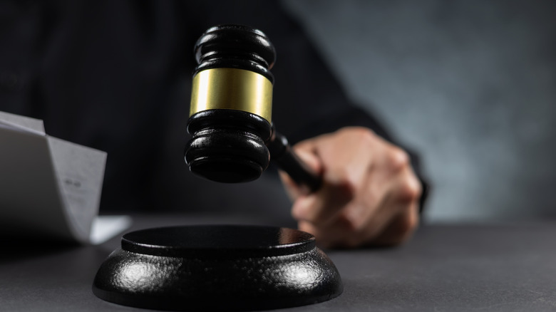 judge's hand banging gavel