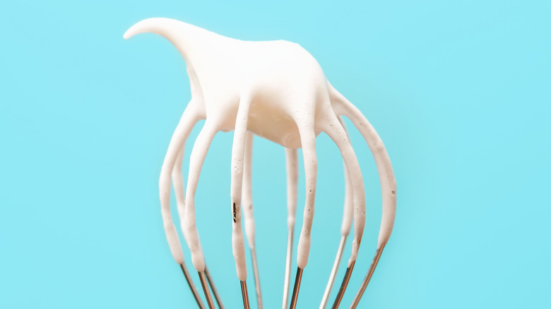 mixer with whipped cream on it