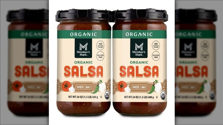 Two jars of Member's Mark Organic Salsa on a white background.