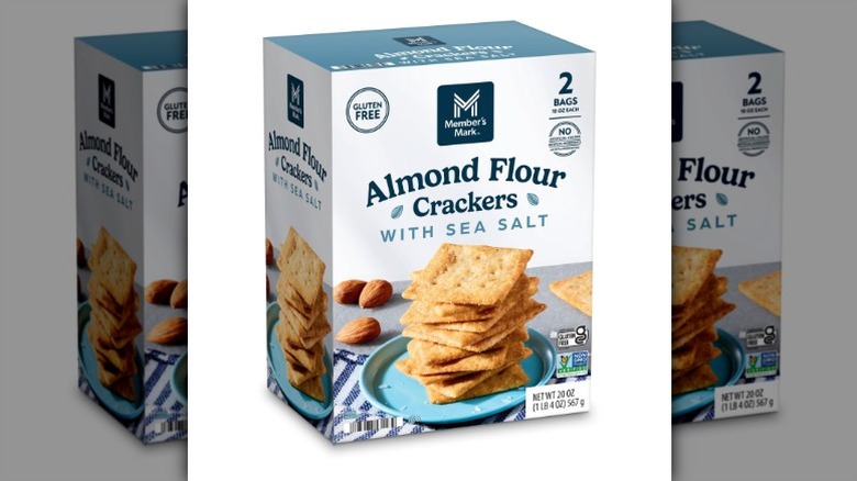 A box of Member's Mark Almond Flour Crackers with Sea Salt on a white background.