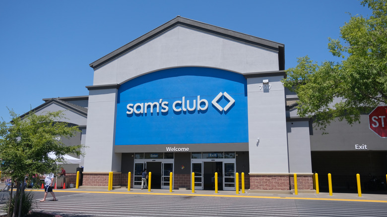 The outside of a Sam's Club store seen from the parking lot.