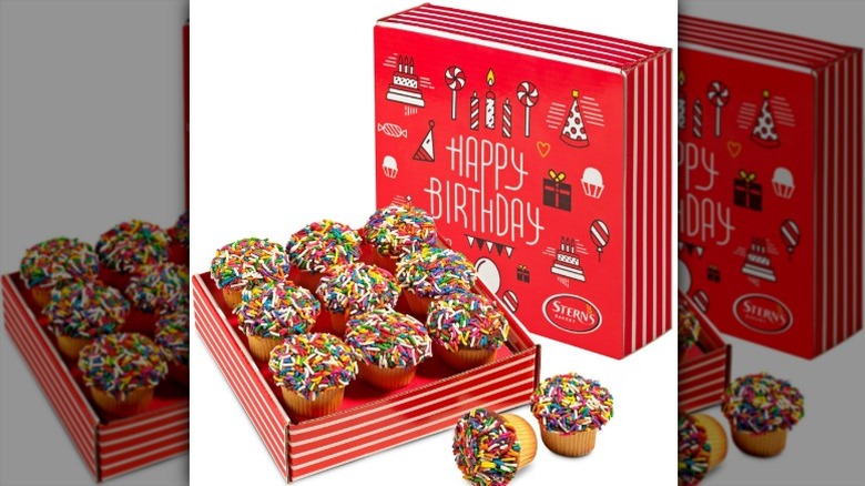 Stern's Bakery Birthday Cupcakes in a red cardboard box with the inscription 'Happy Birthday' and various birthday-themed images