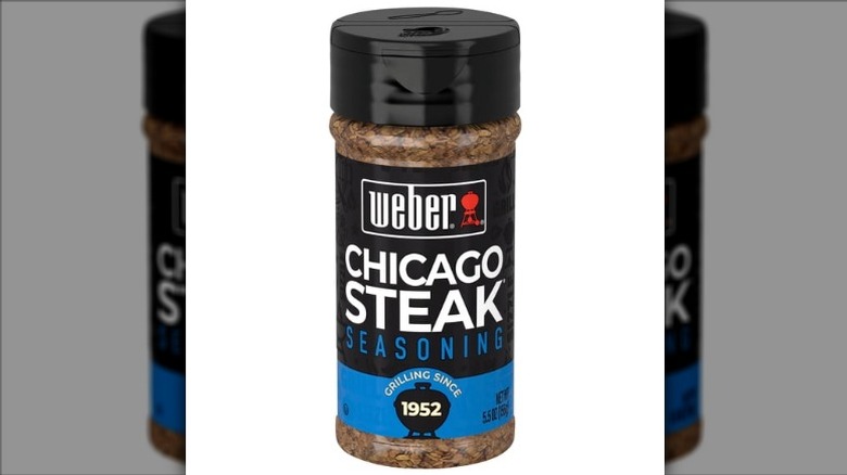 A jar of Weber Chicago Steak Seasoning on a white background.