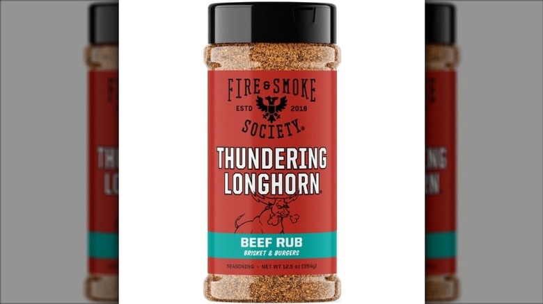 A jar of Fire & Smoke Society Thundering Longhorn Beef Rub on a white background.