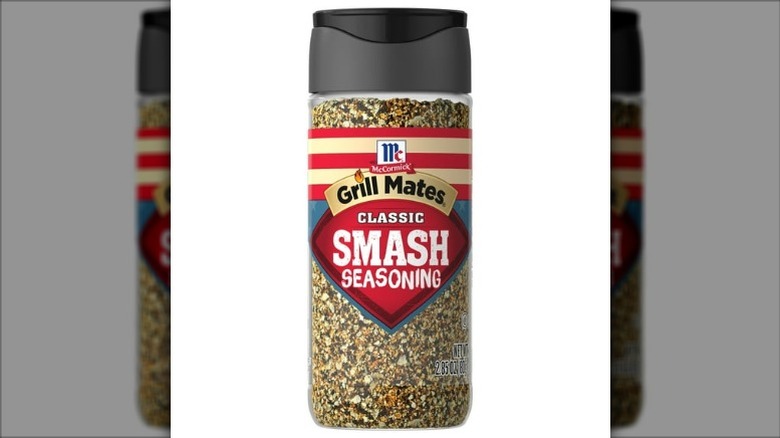 A jar of Grill Mates Classic Smash Seasoning on a white background.