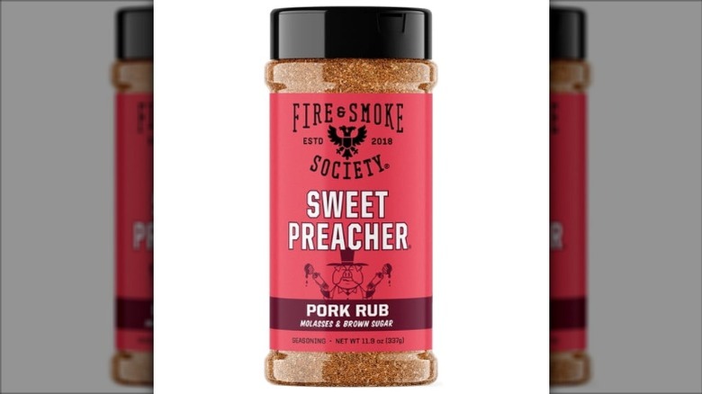 A jar of Fire & Smoke Society Sweet Preacher pork rub on a white background.