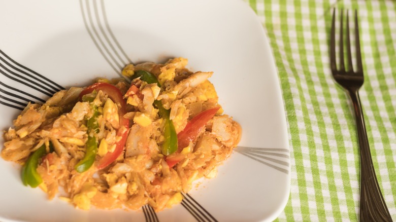 Ackee and saltfish on a plate with a fork