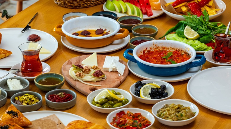 Traditional Turkish breakfast spread called Kahvalti including cheese, fruits, and olives